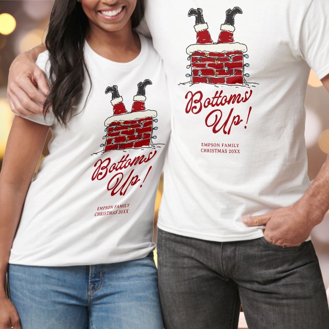 T-shirt Santa Bottoms Up Funny Matching Holiday Party (White Christmas t-shirts with Santa upside down in a chimney, whimsical lights, red “Bottoms Up!” )
