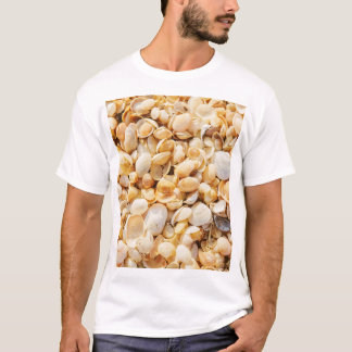 T-shirt Seashell texturé arrière - plan de plage d'été.