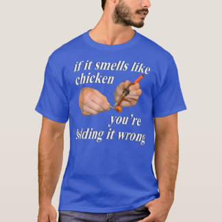 T-shirt Si ça sent le poulet, vous le tenez mal