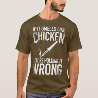 T-shirt Si ça sent le poulet, vous le tenez mal