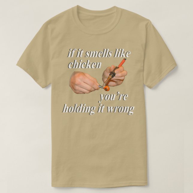 T-shirt Si ça sent le poulet, vous le tenez mal (Design devant)