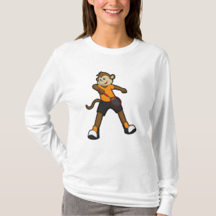 T-shirt Singe comme joueur de tennis avec raquette de tenn