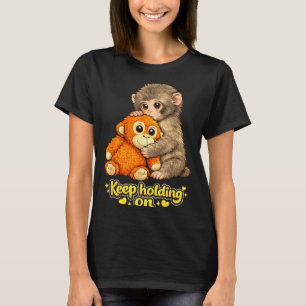 T-shirt Singe poing avec ours en peluche câlinant continue