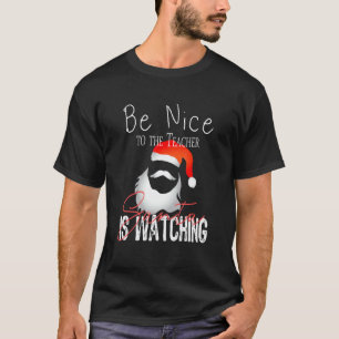 T-shirt Sois gentil avec le professeur, le Père Noël surve