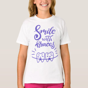 T-shirt Sourire avec les dents de sourire des croisillons