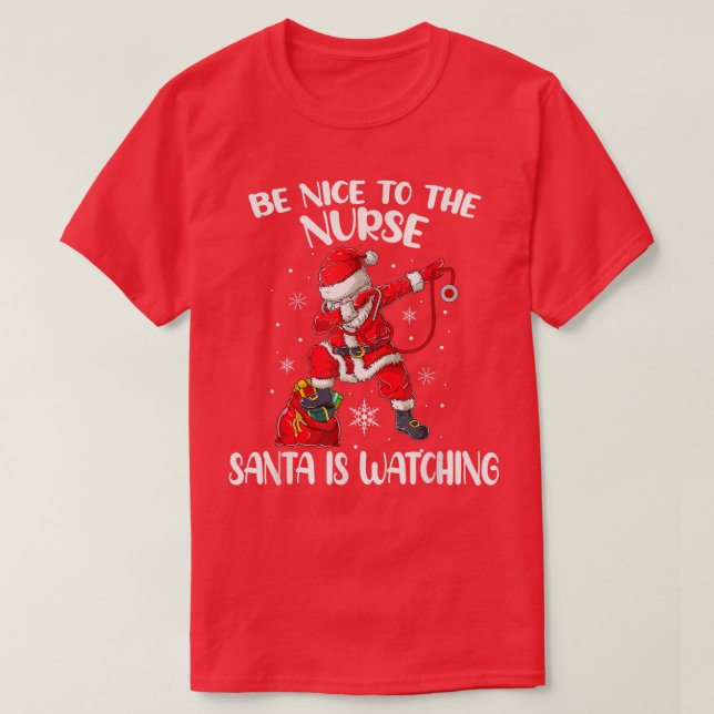 T-shirt Soyez Gentil Avec L'Infirmière Père Noël Regarde L (Design devant)