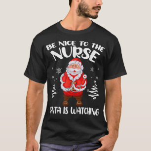 T-shirt Soyez gentil avec l'infirmière Santa regarde Noël