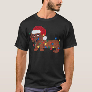 T-shirt Teckel embrouillé dans des lumières de Noël