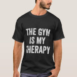 T-shirt The Gym Is My Therapy Funny Gym dire<br><div class="desc">Est-ce que l'entraînement, la salle de sport, l'humour, le culturiste, la remise en forme, les mots cardio qui invoquent votre intérêt? Si oui, alors ce dicton est parfait pour vous. gym, thérapie, t-shirt, entraînement, humour, culturiste, fitness, cardio, mots, invoke, interest, parfait, cool, design, drôle, citation The Gym Is My Therapy...</div>