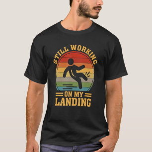 T-shirt Toujours Travailler Sur Mon Atterrissage Blessé Ja