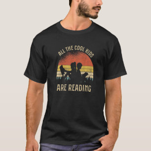 T-shirt Tous Les Enfants Cool Lisent Livre Retro Sunset