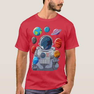 T-shirt Un astronaute jouant aux planètes système solaire