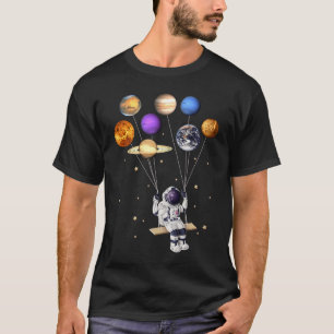 T-shirt Un astronaute tient des ballons planètes Science S