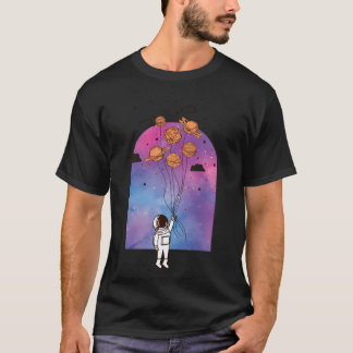 T-shirt Un astronaute voyage avec des planètes