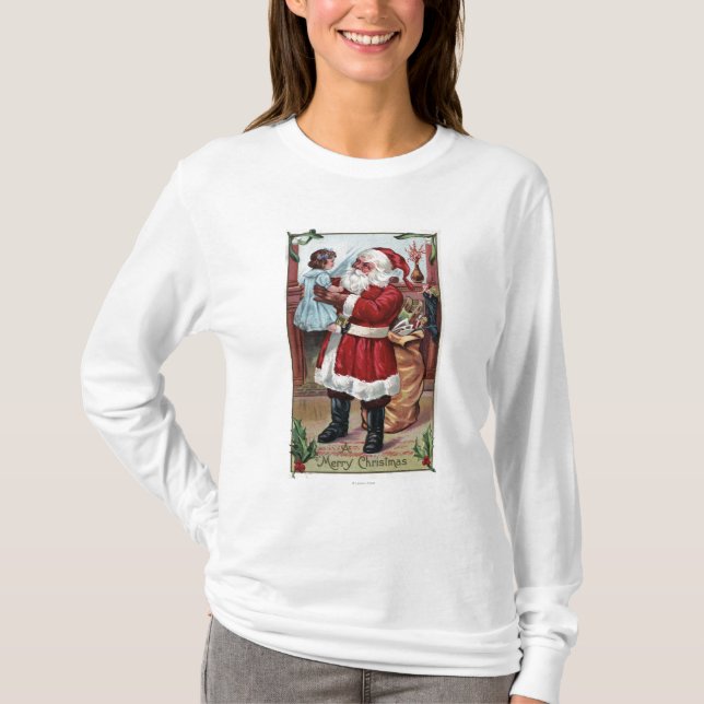 T-shirt Un joyeux ChristmasSanta tenant la fille dans le (Devant)