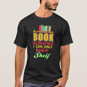 T-shirt Un Livre Tombé Sur Ma Tête Je Ne Peux Que Blâmer M
