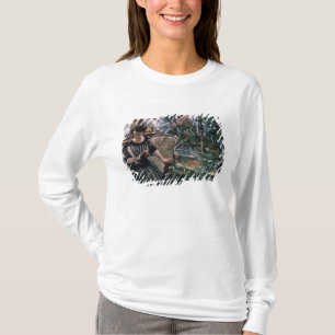 T-shirt Une femme lisant près d'un réservoir de poisson