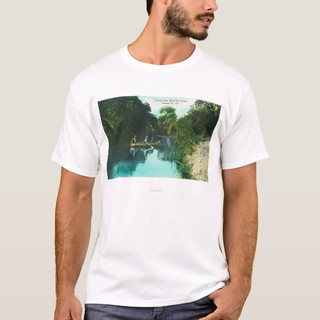T-shirt Une scène de crique avec la famille dans un canoë (Devant)