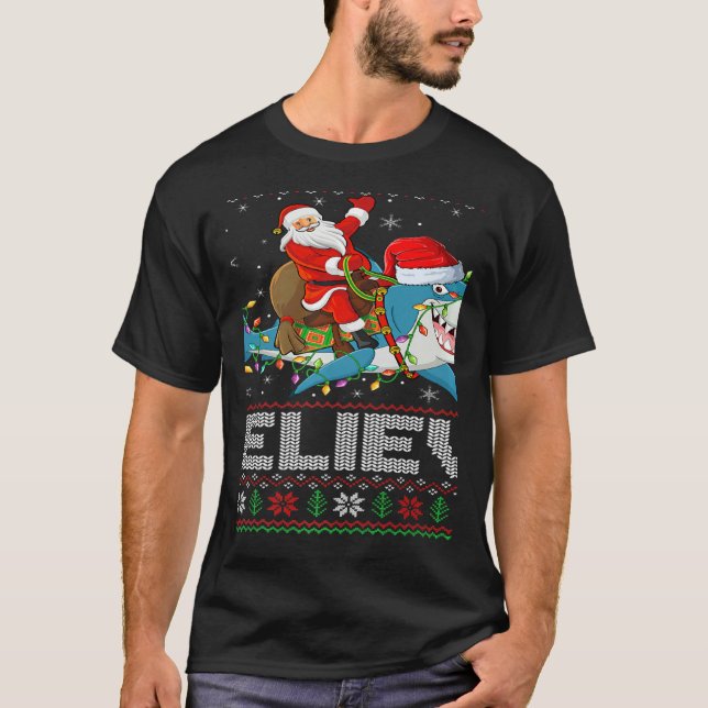 T-shirt Xmas Lights Shark Believe Ugly Santa Riding Shark  (Devant)