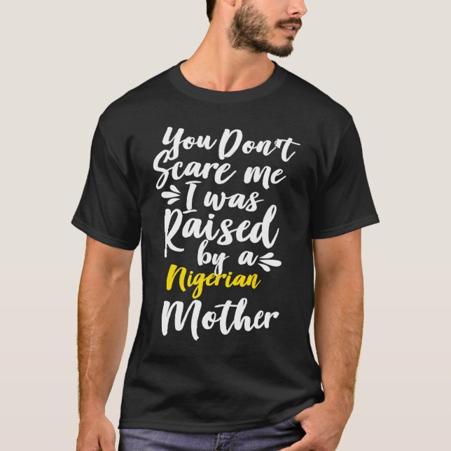T-shirt You Don't Scare Me I Was Raised By A Nigerian (Devant)