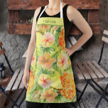 Tablier Ananas et fleurs Personnalisé<br><div class="desc">Ce tablier est personnalisé avec votre nom sur une aquarelle design d'ananas,  de fleurs tropicales et de verdure. CORRESPONDRE des articles dans notre magasin.</div>