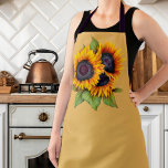 Tablier Aquarelle jaune orangé grand tournesol vert<br><div class="desc">Beau tablier vert avec grand bouquet de tournesols vibrants dans les tons jaune vif et orange brûlé avec fougère et feuillage vert sauge. Parfait pour apporter une ambiance champêtre été ou automne dans votre cuisine!</div>