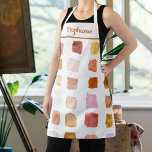 Tablier Aquarelle rouille personnalisée Artiste Apron<br><div class="desc">Ce tablier est décoré d'un motif d'échantillons d'aquarelles dans les tons rouille et marron. Parfait pour un artiste ou quelqu'un qui aime peindre. Personnalisez cet tablier avec votre nom ou votre monogramme. Parce que nous créons notre travail artistique, vous ne trouverez pas ce design exact d’autres designers. Aquarelle originale ©...</div>