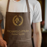 Tablier Barber name gold logo barber shop brown leather<br><div class="desc">Personalized barbershop apron with faux gold scissors and laurel wreath logo (you can replace it with your own!) and with the barber's name and title over a dark brown leather look background.           Perfect for a professional look.</div>
