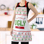 Tablier Chandail de Noël moche Nordic Red Green Knit Nom<br><div class="desc">"Mange, bois et sois moche." Voici une façon merveilleuse d’ajouter à l’amusement de votre cuisine de vacances. Ajoutez un éclat supplémentaire à vos aventures culinaires de vacances chaque fois que vous portez ce tablier de Noël unique, lunatique, moderne, personnalisé. Un joli motif nordique tricoté à l'îlot, d'arbres capricieux, de rennes,...</div>