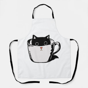 Tablier Chaton noir avec nez rouge caché dans une tasse