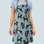 Tablier Chats Tuxedo noirs et blancs<br><div class="desc">Chats tuxedo noirs et blancs mignons qui vaquent à leurs affaires. Un motif amusant sur un arrière - plan bleu moyen. Art original de Nic Squirrell.</div>