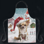 Tablier Chihuahua Winter Wonderland Christmas Joy<br><div class="desc">Ce design festif reflète l'esprit joyeux de la période des fêtes, avec un adorable petit portant un chapeau de Père Noël. Le chien est niché dans un pays des merveilles hivernales, avec un bonhomme de neige, un sapin de Noël décoré et des cadeaux joliment emballés. Les flocons de neige tombent...</div>