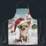 Tablier Chihuahua Winter Wonderland Christmas Joy<br><div class="desc">Ce design festif reflète l'esprit joyeux de la période des fêtes, avec un adorable petit portant un chapeau de Père Noël. Le chien est niché dans un pays des merveilles hivernales, avec un bonhomme de neige, un sapin de Noël décoré et des cadeaux joliment emballés. Les flocons de neige tombent...</div>