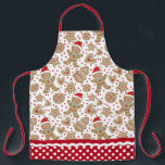 Tablier Cuite pain d'épices de Noël<br><div class="desc">Un motif de biscuits en pain d'épice de vacances décore cet tablier. Bordure de tablier a un motif de pois rouge et blanc avec ric rac. Fait un cadeau amusant pour Noël. Conçu pour vous par Blackberry Boulevard.</div>