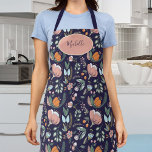 Tablier Cute botanique pastel motif floral nom marine<br><div class="desc">Joli tablier bleu marine à motifs floraux rose,  orange et vert sauge avec nom ou texte personnalisé sur une forme géométrique ovale rose-rousse.</div>