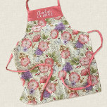 Tablier Élégant modèle floral rose<br><div class="desc">Un motif floral assez vintage, personnalisé avec votre nom, orne ce tablier de cuisine. Personnalisez-le pour un cadeau. Changez les mots pour correspondre à votre occasion de don. Grand cadeau pour la Fête des Mères, les amis, les cadeaux de Noël ou juste pour la raison. Conçu pour vous par Blackberry...</div>
