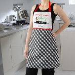 Tablier Équipe de cuisine de vacances Plaid Noël<br><div class="desc">Ce joli tablier de Noël contient le texte "Équipe de cuisine de vacances". La partie inférieure de l'aire est en damier noir et blanc. Personnalisez ce tablier de vacances amusant avec votre nom.</div>