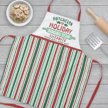 Tablier Équipe de pâtisserie de Noël Fête des biscuits<br><div class="desc">Célébrez le temps ensemble à la maison dans la cuisine avec un tablier rayé rouge & vert personnalisé Holiday Baking Team. Tout le texte sur ce modèle est simple à customiser. Le design comprend des rayures verticales rouges, vertes et blanches, de mignons feuilles saints et des baies, une épingle roulante,...</div>