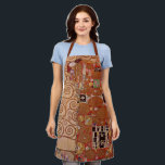 Tablier Exécution par Gustav Klimt, Art Nouveau vintage<br><div class="desc">L'Accomplissement (alias L'Étreinte) (1909) de Gustav Klimt est une peinture à l'huile de l'ère victorienne symboliste représentant un jeune couple s'étreignant avant de s'embrasser, un thème d'amour et de romance. À propos de l'artiste : Gustav Klimt (1862-1918) était un peintre symboliste autrichien et l'un des membres les plus éminents du...</div>