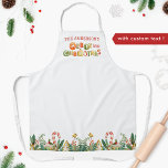 Tablier Famille personnalisée Joyeux Petit Noël<br><div class="desc">Superbe tablier de vacances avec possibilité d'ajouter votre nom de famille ! Design unique avec espace pour votre nom/nom de famille présenté par de beaux cookies de vacances avec l'orthographe "Joyeux Noël". Capacité de garder, retirer ou changer "petit" de "Joyeux petit Noël" phrase. Basse zone avec une frontière festive exquise...</div>