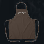 Tablier Femme Sombre Brown Script Chef personnalisé<br><div class="desc">Montrez votre style tout en cuisine avec ce Script Brown foncé féminin Apron Chef personnalisé. Le nom est conçu dans un élégant script blanc centré sur l'avant d'un tablier marron solide. Le nom est en caractères blancs à la mode sur le centre supérieur. Idéal pour protéger les vêtements contre les...</div>