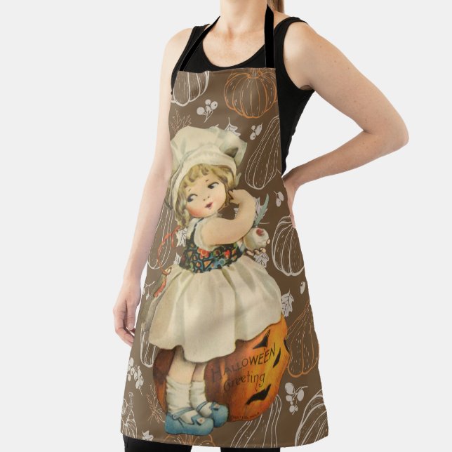 Tablier Fille sculptant une pomme Halloween (Insitu)