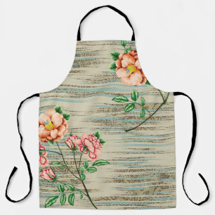 Tablier Fleurs vintages orange et rose avec feuilles verts