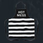 Tablier Funny Hot Mess noir blanc rayé<br><div class="desc">Ajoutez un peu de rire à votre temps de cuisine avec ce Funny Hot Mess Black White Striped Apron. Il est conçu avec des rayures horizontales et des lettres blanches en gras sur la surface solide supérieure. Vous pouvez également customiser les couleurs et le texte.</div>