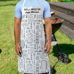 Tablier Funny Personnalisé Barbecue Grill Chef Barbecue Ma<br><div class="desc">Un tablier amusant avec un motif vintage de divers outils de grillades. Ajoutez deux lignes de texte personnalisé à personnaliser. Parfait pour tous ceux qui aiment le barbecue,  le grill et la cuisine. Fait une Fête des pères parfaite,  un anniversaire ou un cadeau de vacances.</div>