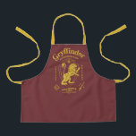 Tablier GRYFFINDOR™ Determination Courage Bravery Crest<br><div class="desc">Show your house pride with this bold Gryffindor™ crest design, celebrating the values that define the bravest of witches and wizards. Featuring the iconic lion standing proudly before a shield, this striking artwork highlights Gryffindor’s core traits — Courage, Determination, and Bravery — in a powerful, vintage-inspired layout. The rich house...</div>