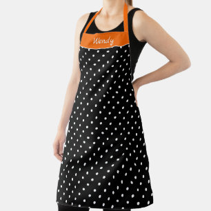 Tablier Halloween orange et noir avec des pois blancs