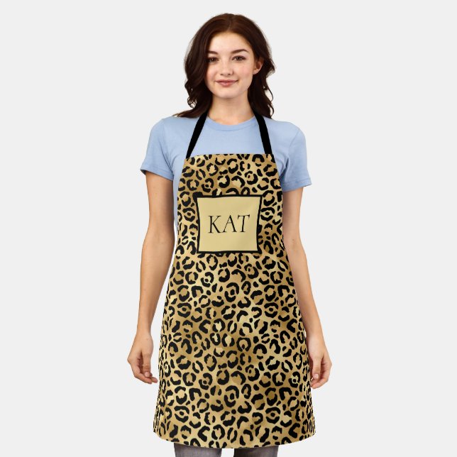 Tablier Imprimé léopard noir et or monogrammé guépard  (Porté)
