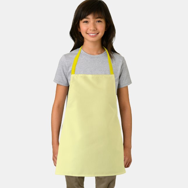Tablier jaune clair présentant un design simple et (Insitu)