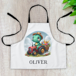 Tablier Joli dinosaure Trex conduisant un tracteur rouge